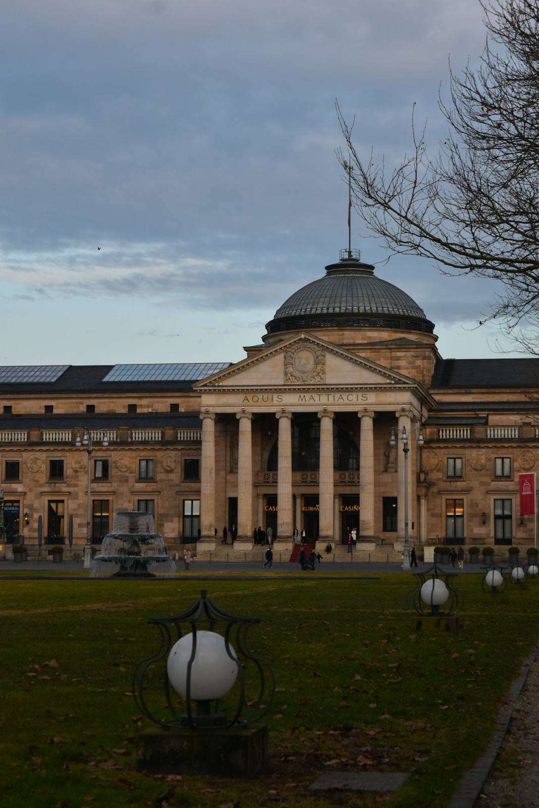Wiesbaden: the Kurhaus behind the Bowling Green at dusk