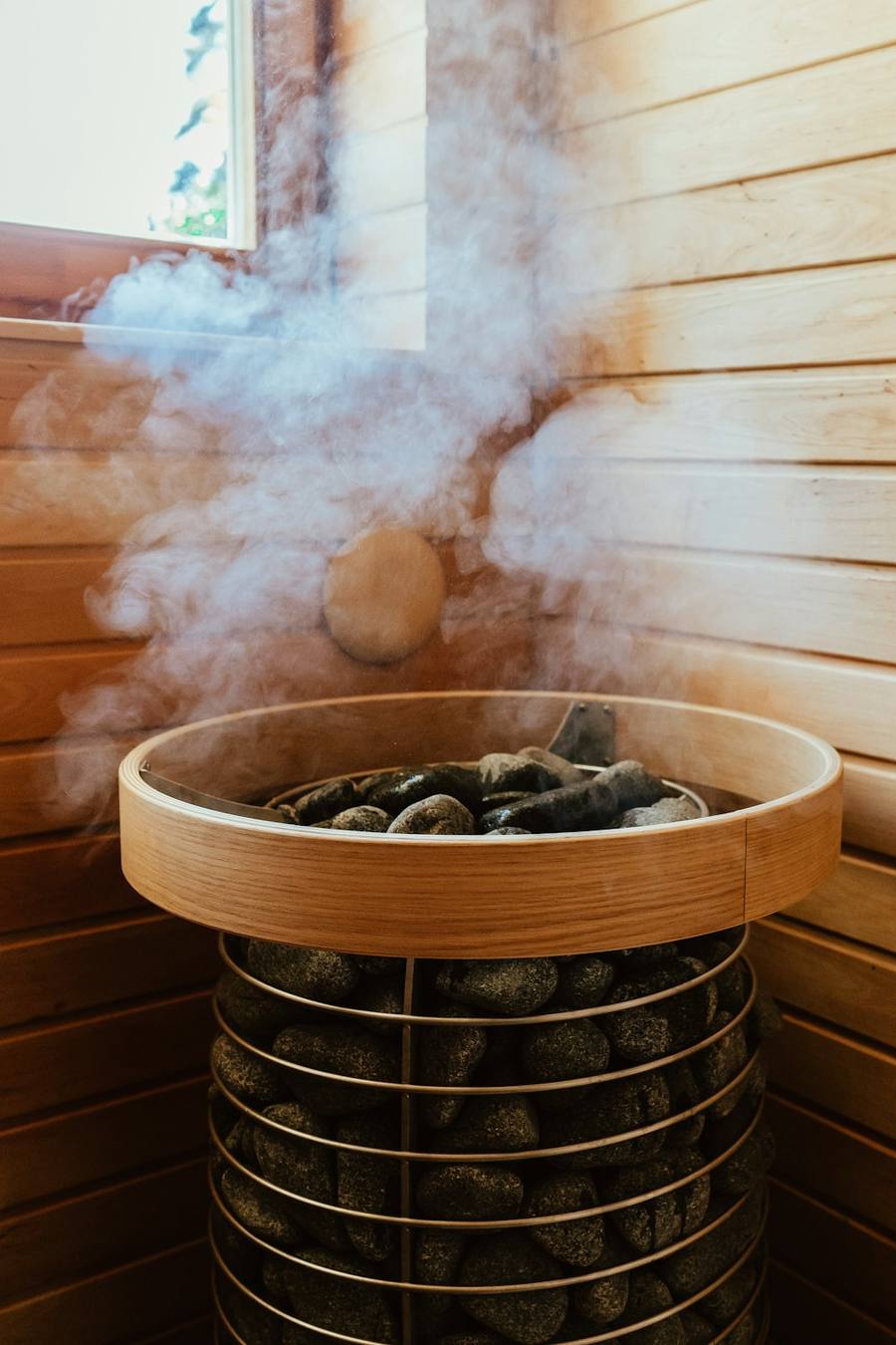 Steam rising from sauna stones