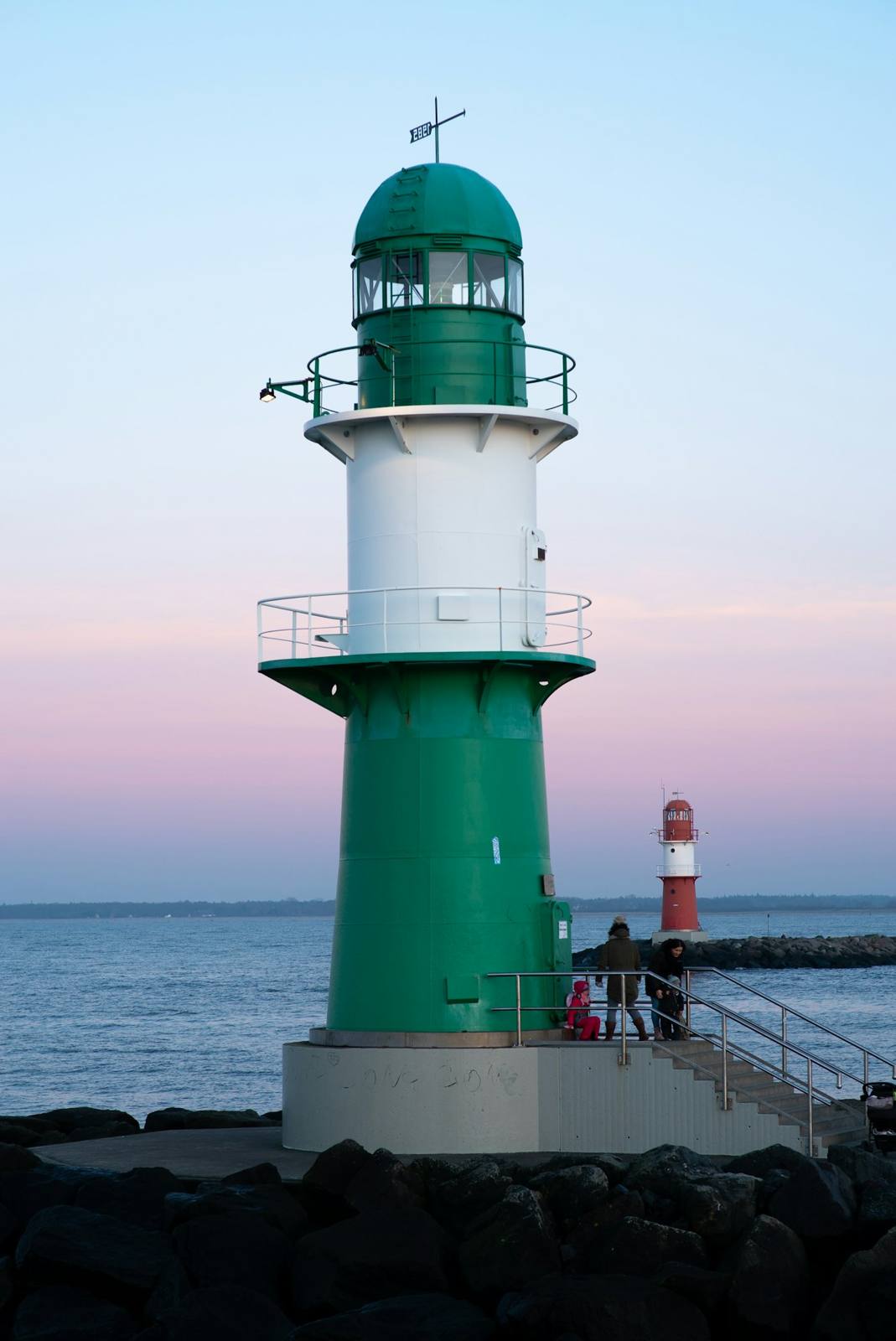 Warnemünde: the pier lighthouse at dusk